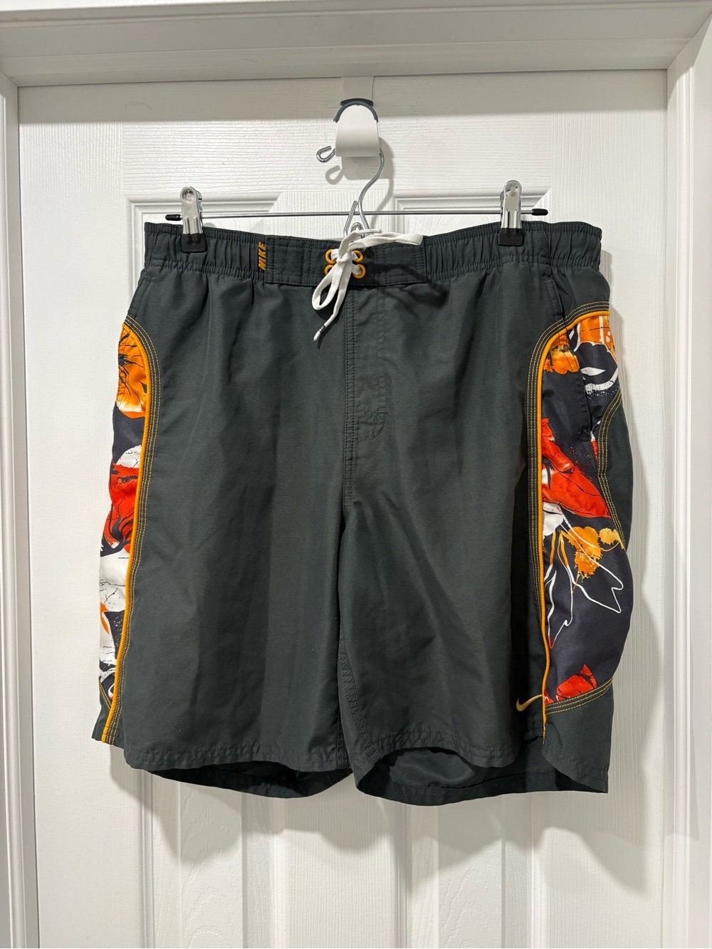 Nike Men's Black Swim Shorts with Orange Floral Side Panels medium